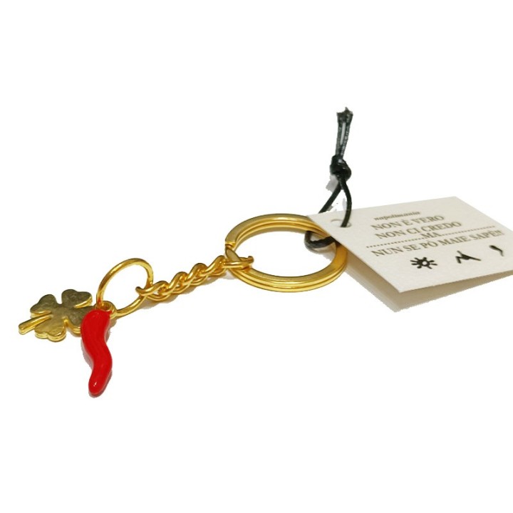Bijou portachiave con cornetto rosso quadrifoglio color oro.